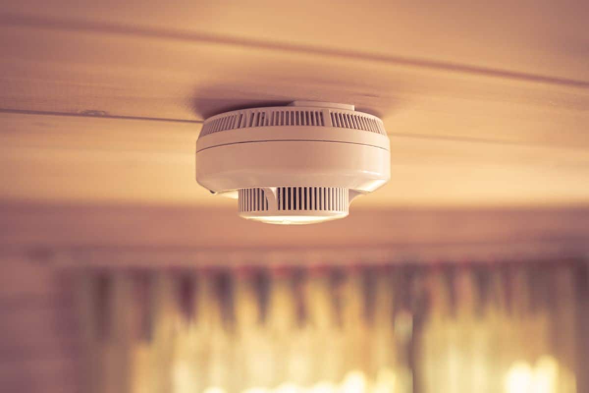 Carbon monoxide detector in a wooden house.
