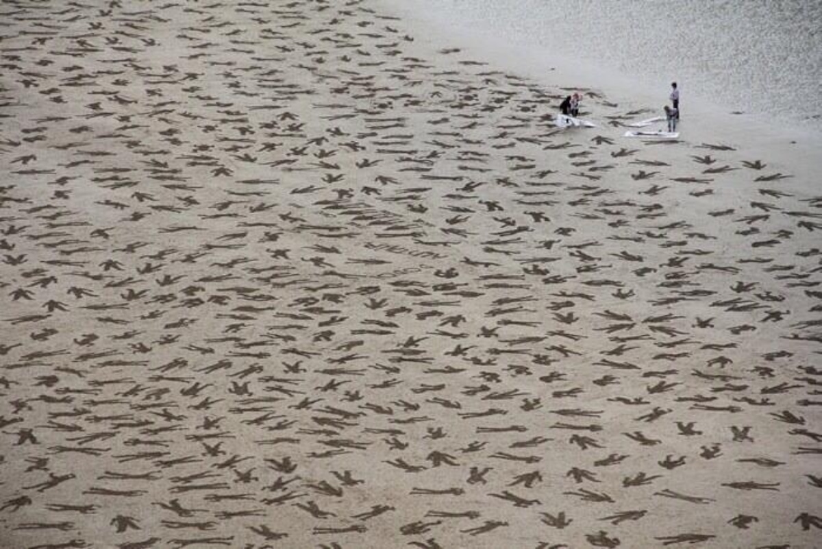 D-Day Memorial in the Sand: 9,000 Bodies Remembered in Normandy