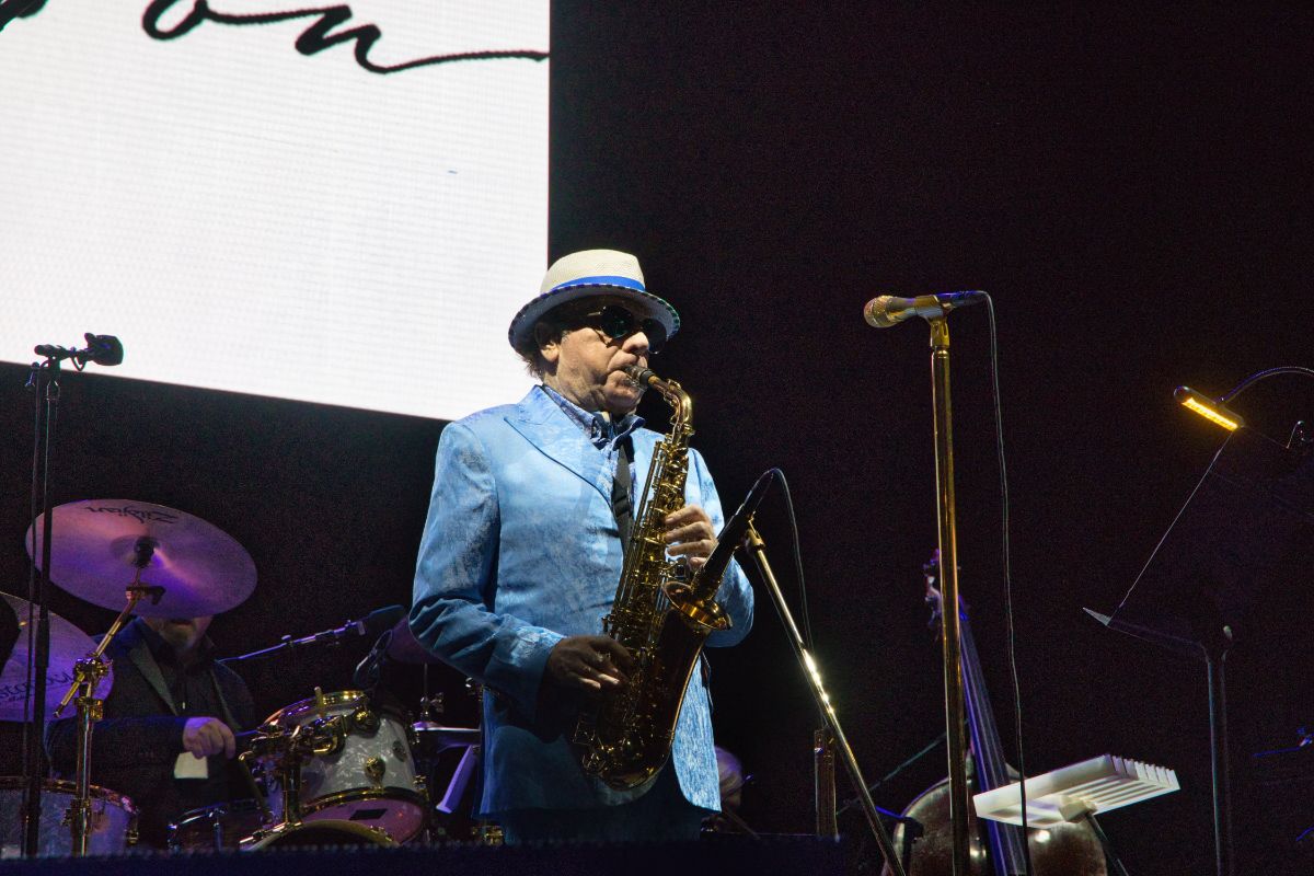 Van Morrison is playing on a saxophone.