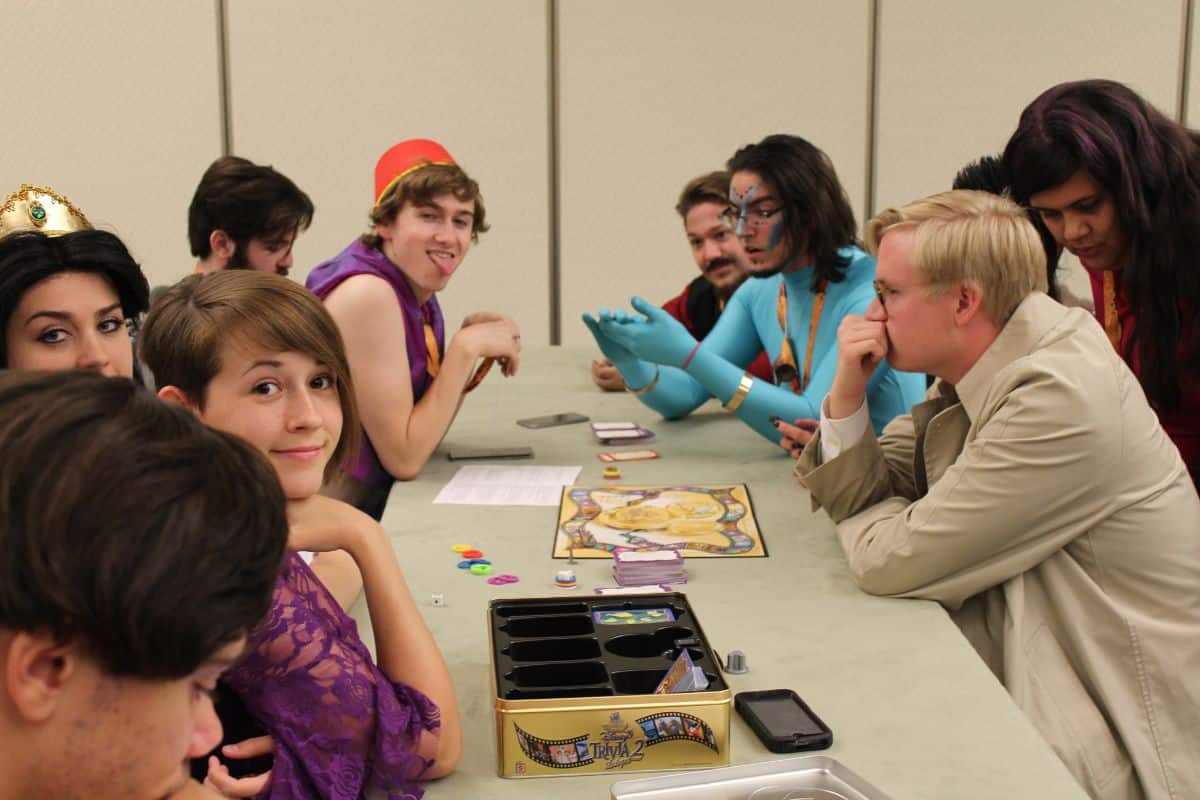 A bunch of people playing tabletop games.