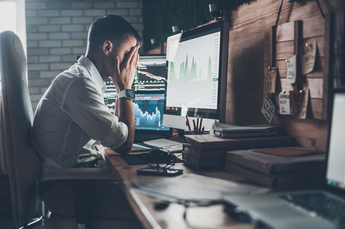 A young, stressed businessman in the work.