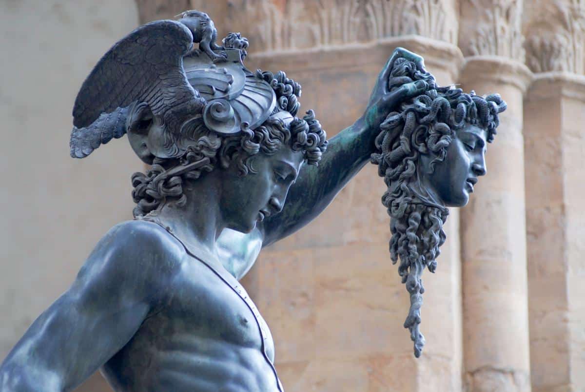 A statue of Perseus holding Medusa's head.