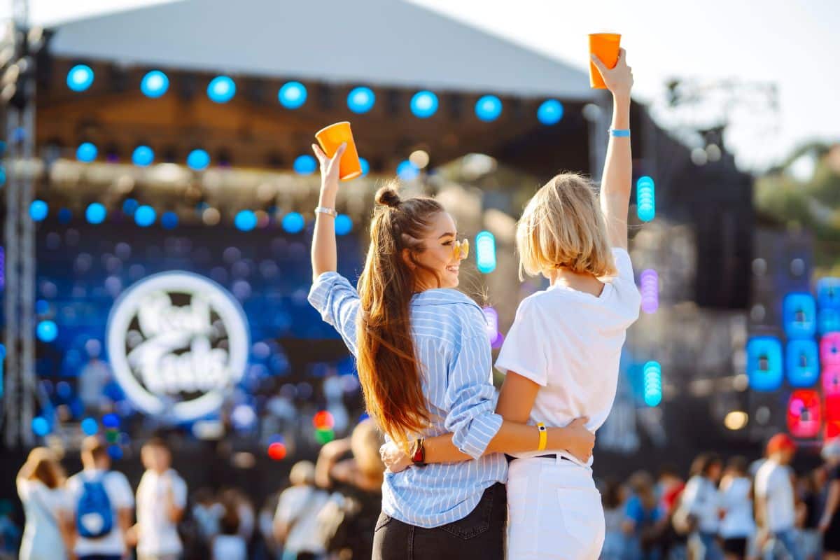 Two young women at a festival.